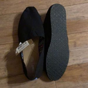 Tom’s size 12 with tags
